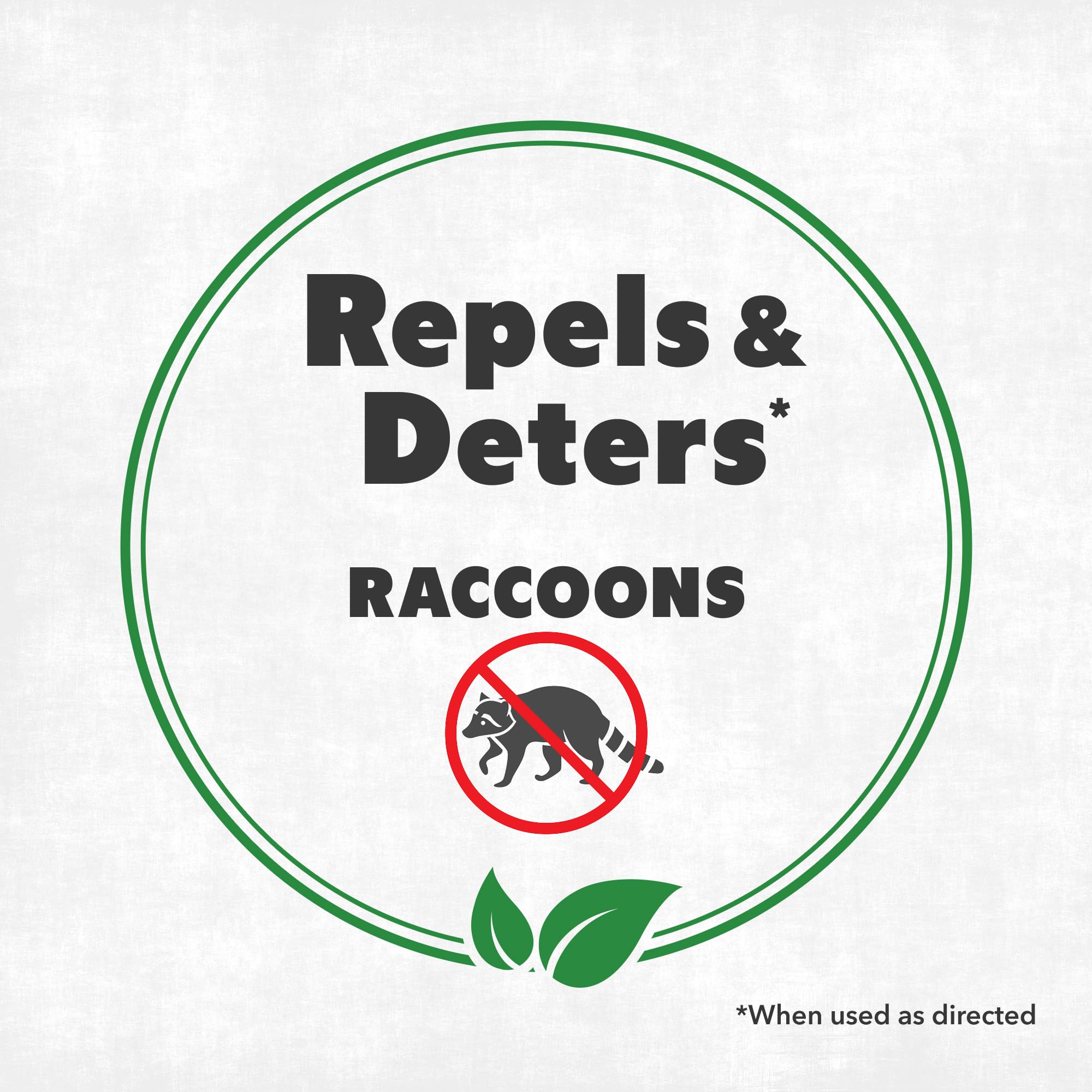 NatureStop Raccoon Repellent Spray outdoors application near garden beds for perimeter protection.
