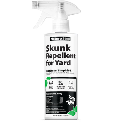 NatureStop skunk repellent spray bottle for outdoor use deterring skunks around yard areas.