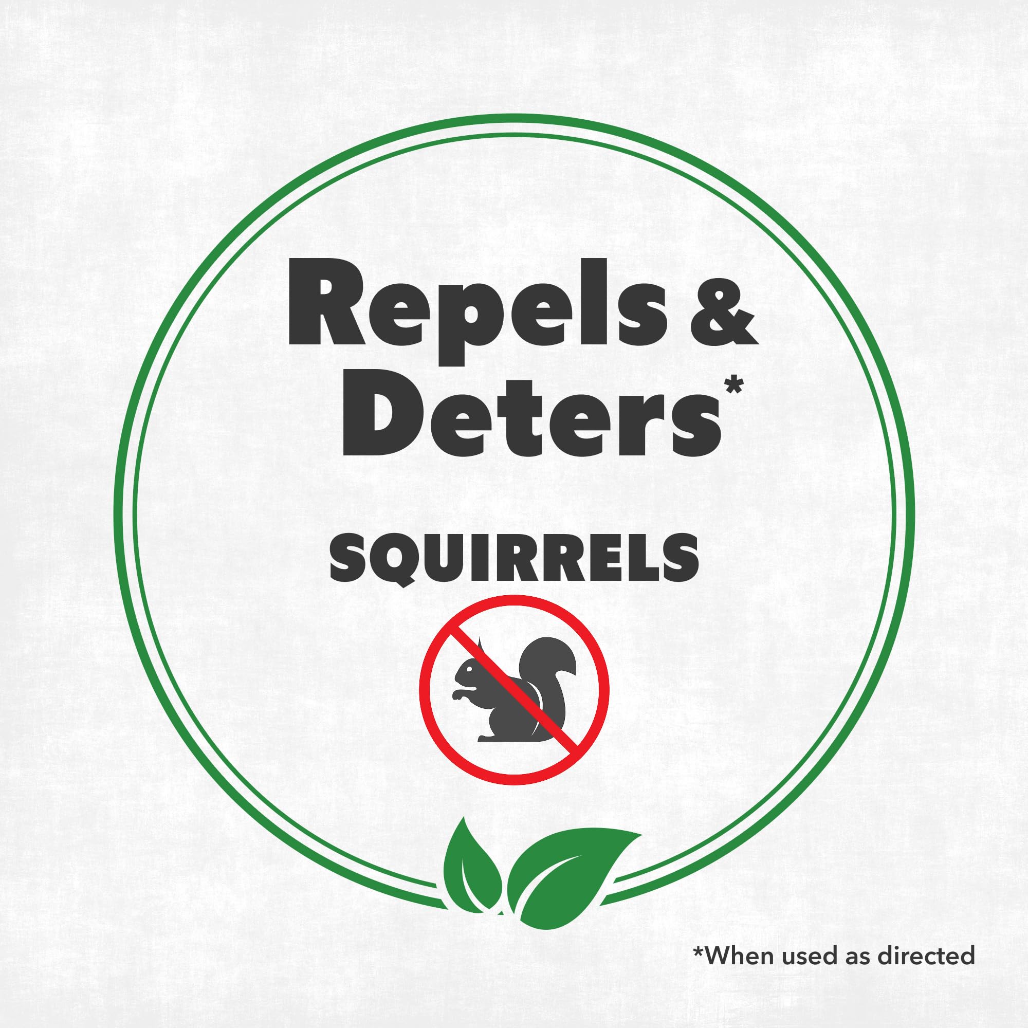 NatureStop Squirrel Repellent Spray applied to a garden bed to deter squirrels.