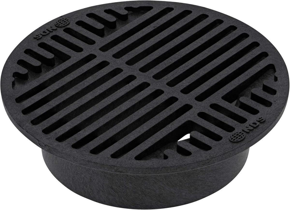 NDS 8-Inch Round Drain Grate over 6-Inch pipe, blocking debris while draining water