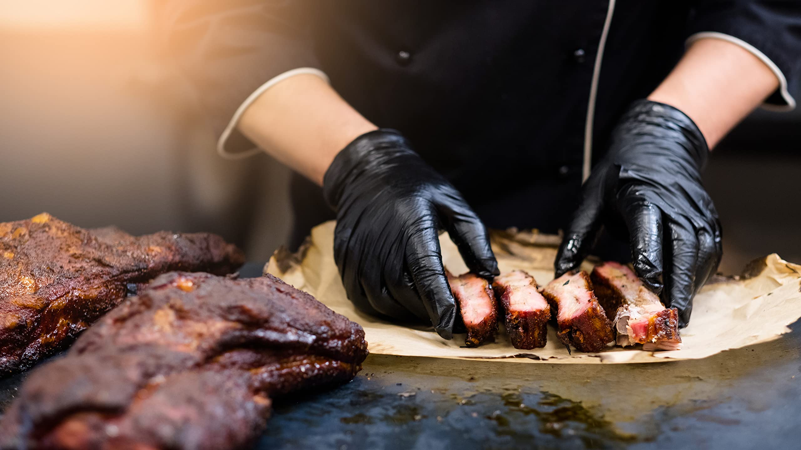 Nechtik BBQ gloves suitable for food service and home grilling.