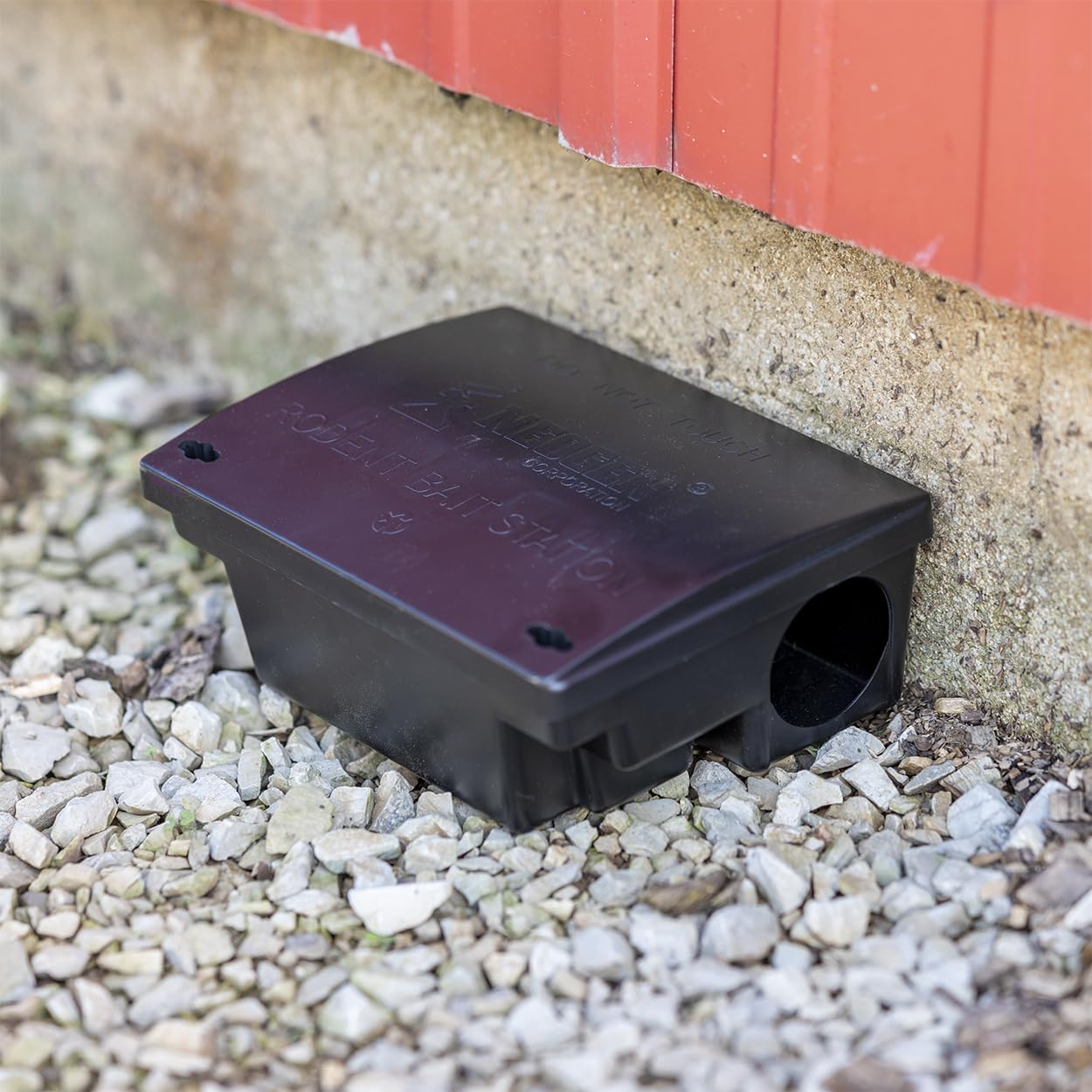 Neogen Ramik station bait secured by interior vertical rods for clean storage