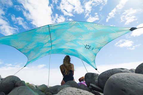 Neso sand anchor bags securing shade on sandy beach conditions