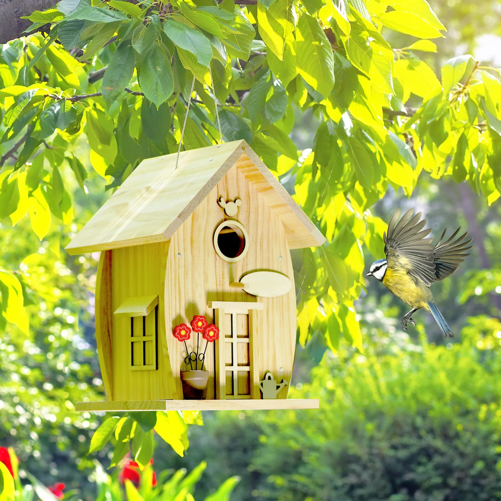 NESTO completed bird house hanging in a sunlit garden to attract birds