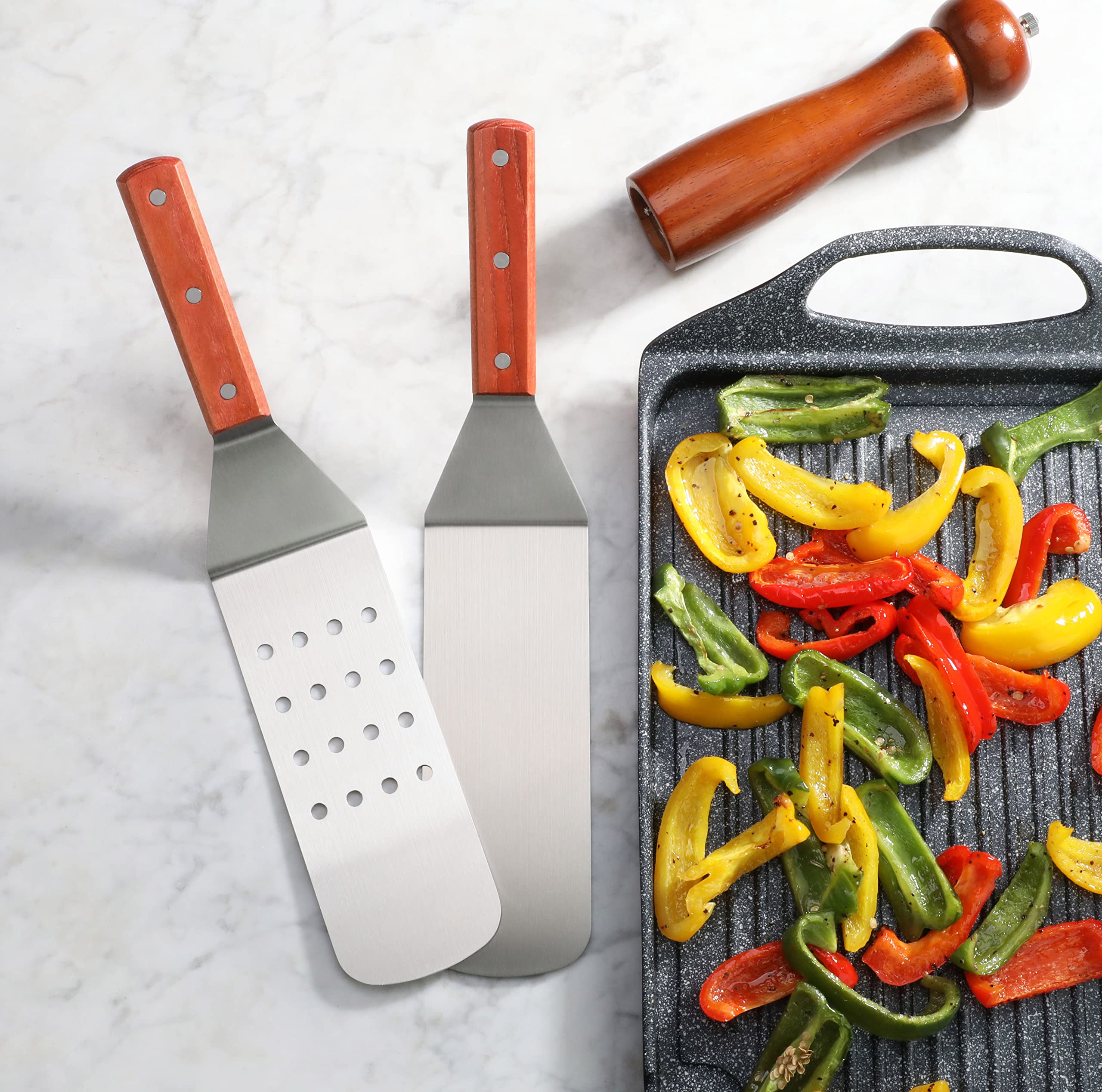 New Star 36336 full-length spatula in use over grill