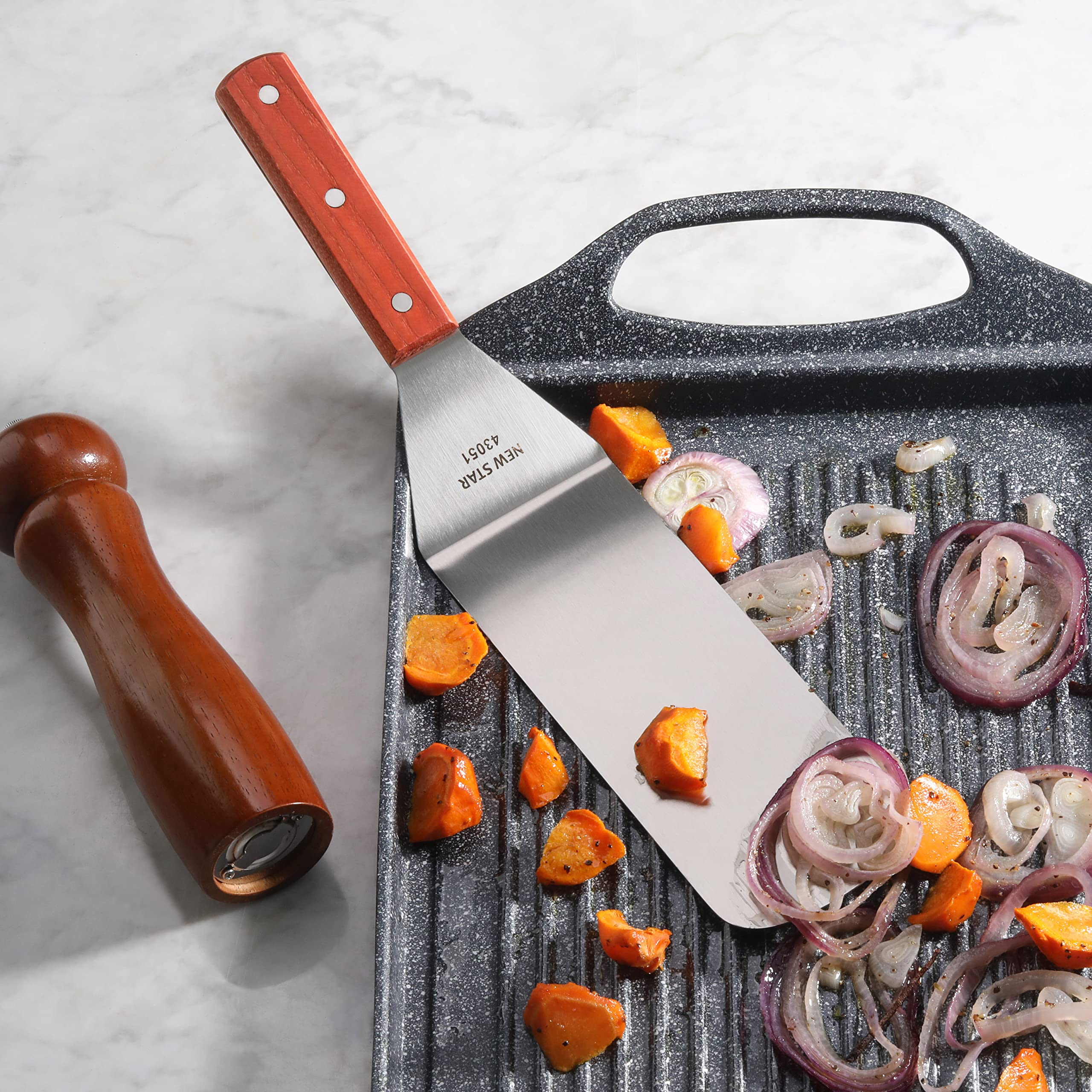 New Star 43051 grill spatula perfect for flipping burgers and kebabs