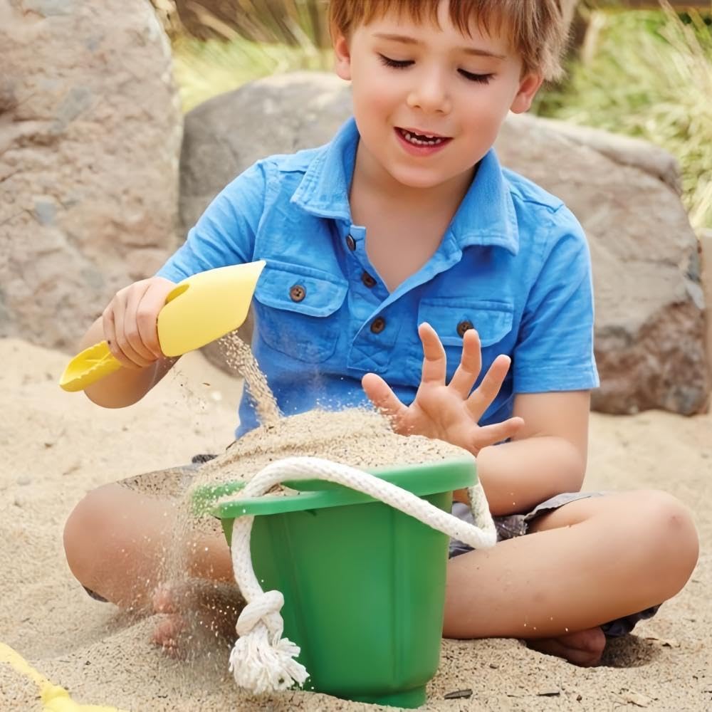 Newflager children gardening activity digging in soil with vibrant shovels.