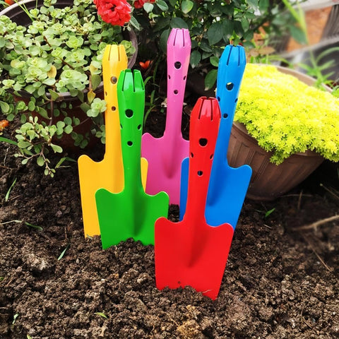Newflager transplanting seedlings with hand shovel for easy planting.