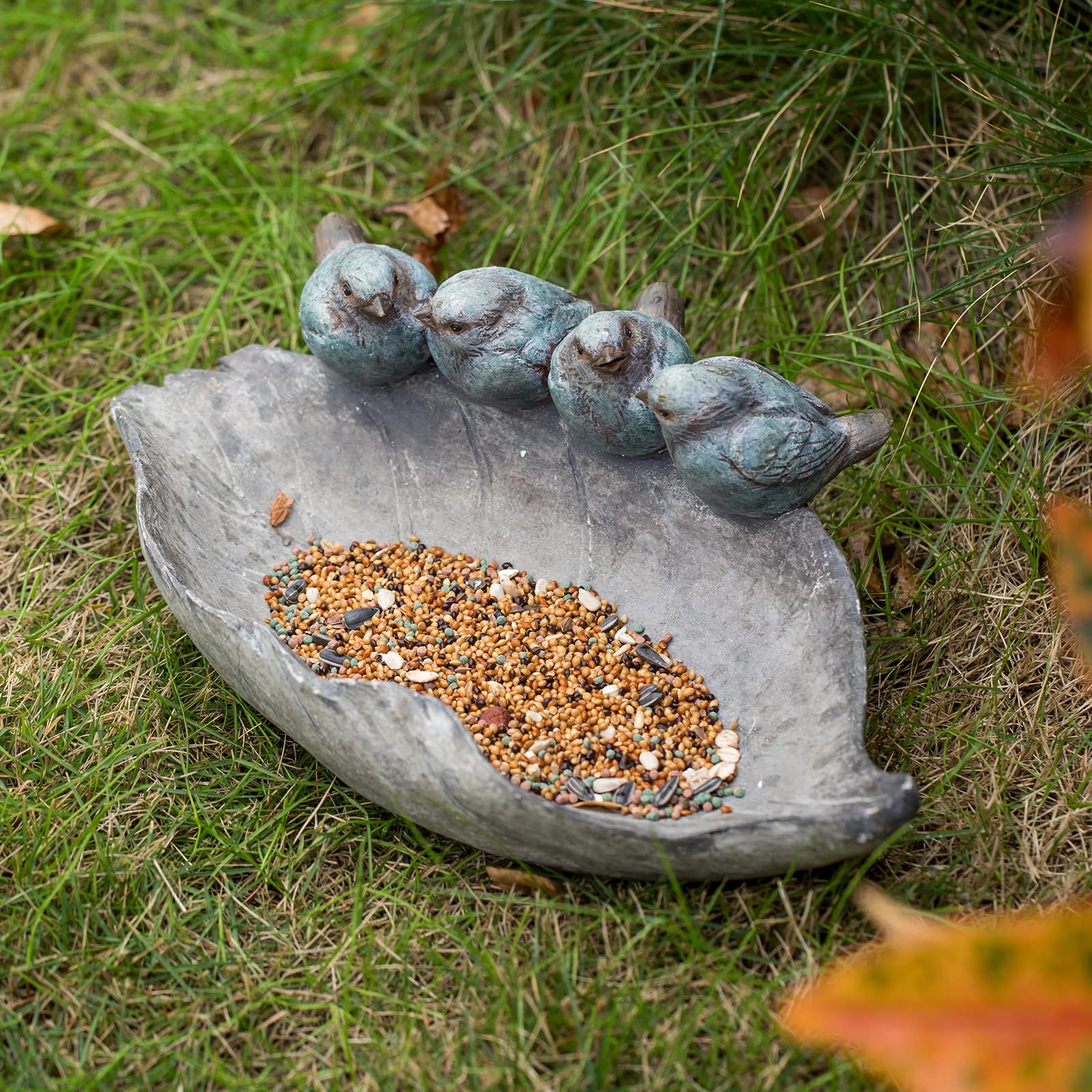 Newman House Studio leaf feeder bowl with distressed finish in garden design