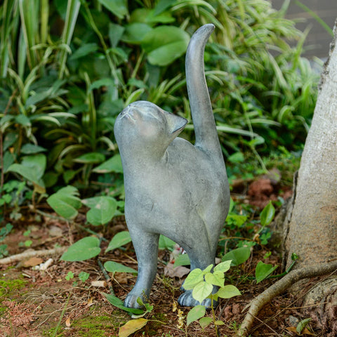 Newman House Studio porch garden cat figure adds welcoming charm