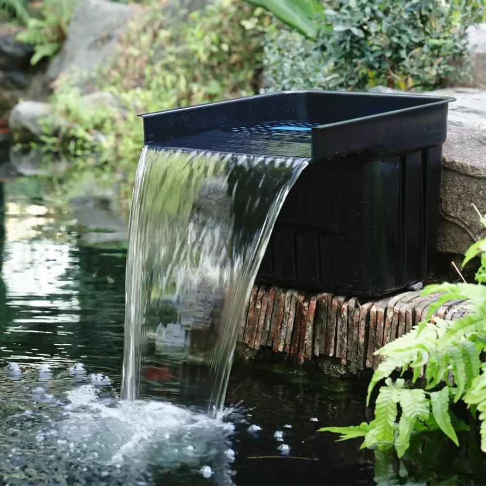 NFESOLAR hidden waterfall blends into landscape for a natural-looking garden feature.