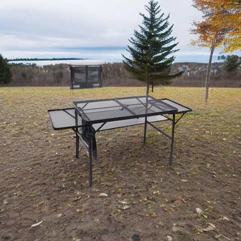 Nice C folding grill table showing side pocket and mesh for organized gear.