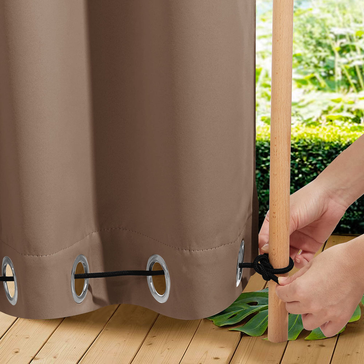 NICETOWN outdoor curtains on a pergola provide privacy and shade in tan-khaki fabric