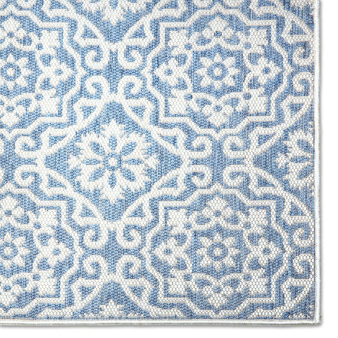 Nicole Miller New York Danica rug weather-resistant for indoor/outdoor use.