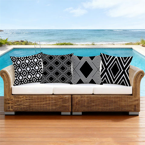 Nightwish 18x18 pillow cover showcasing bold black geometric design for outdoor decor.