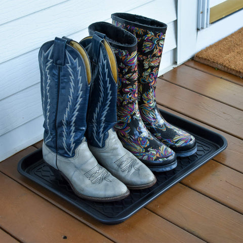 NINAMAR boot tray used for gardening tools and pet supplies in a workspace