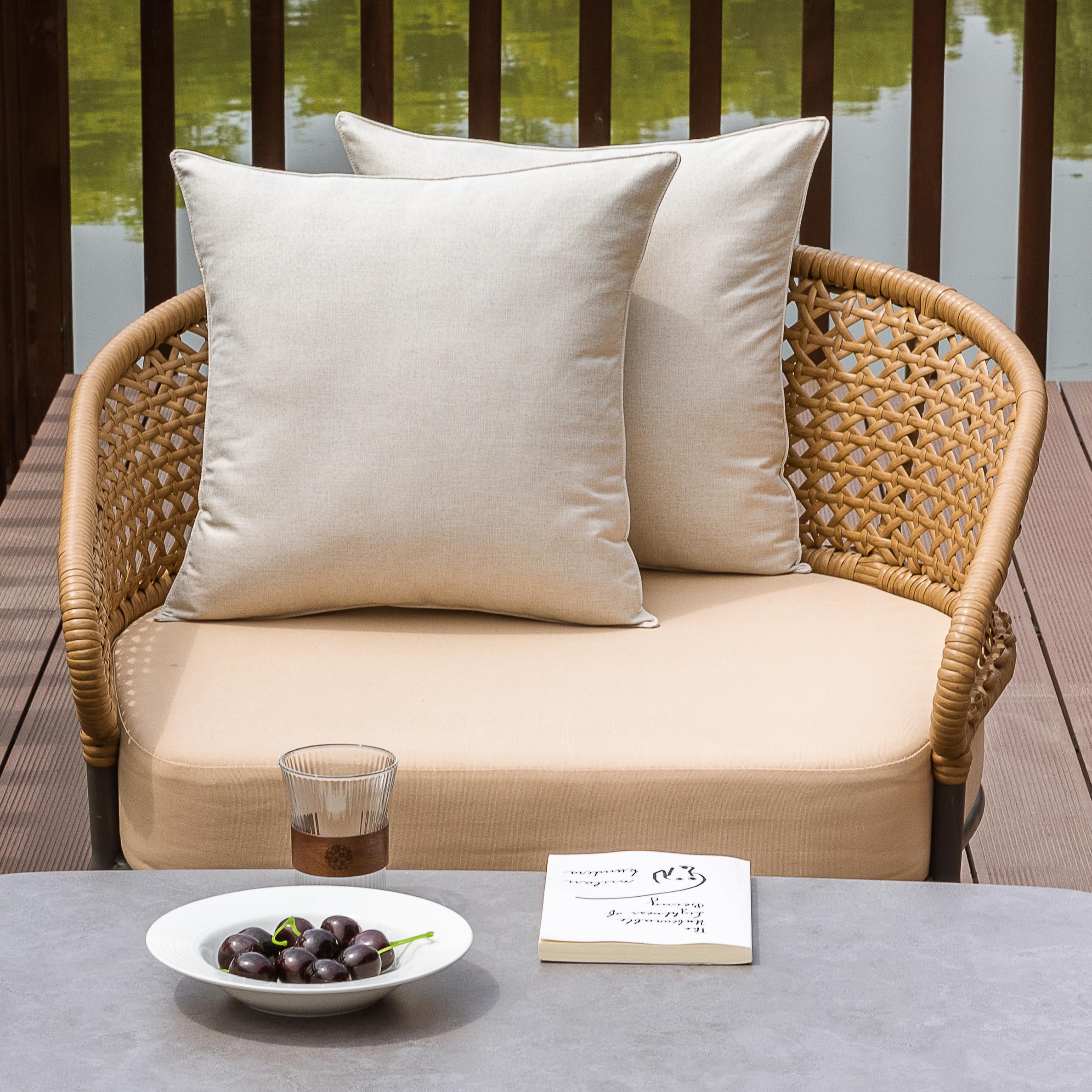 NiNi ALL beige pillow cover water beads close-up showing lotus coating repelling moisture