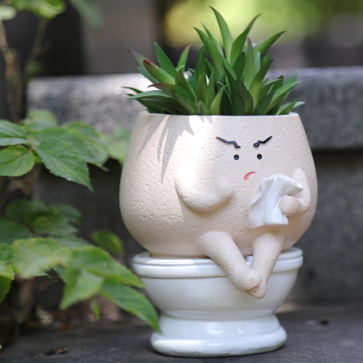 NINIPAPA funny face toilet planter with self-watering design for easy care.