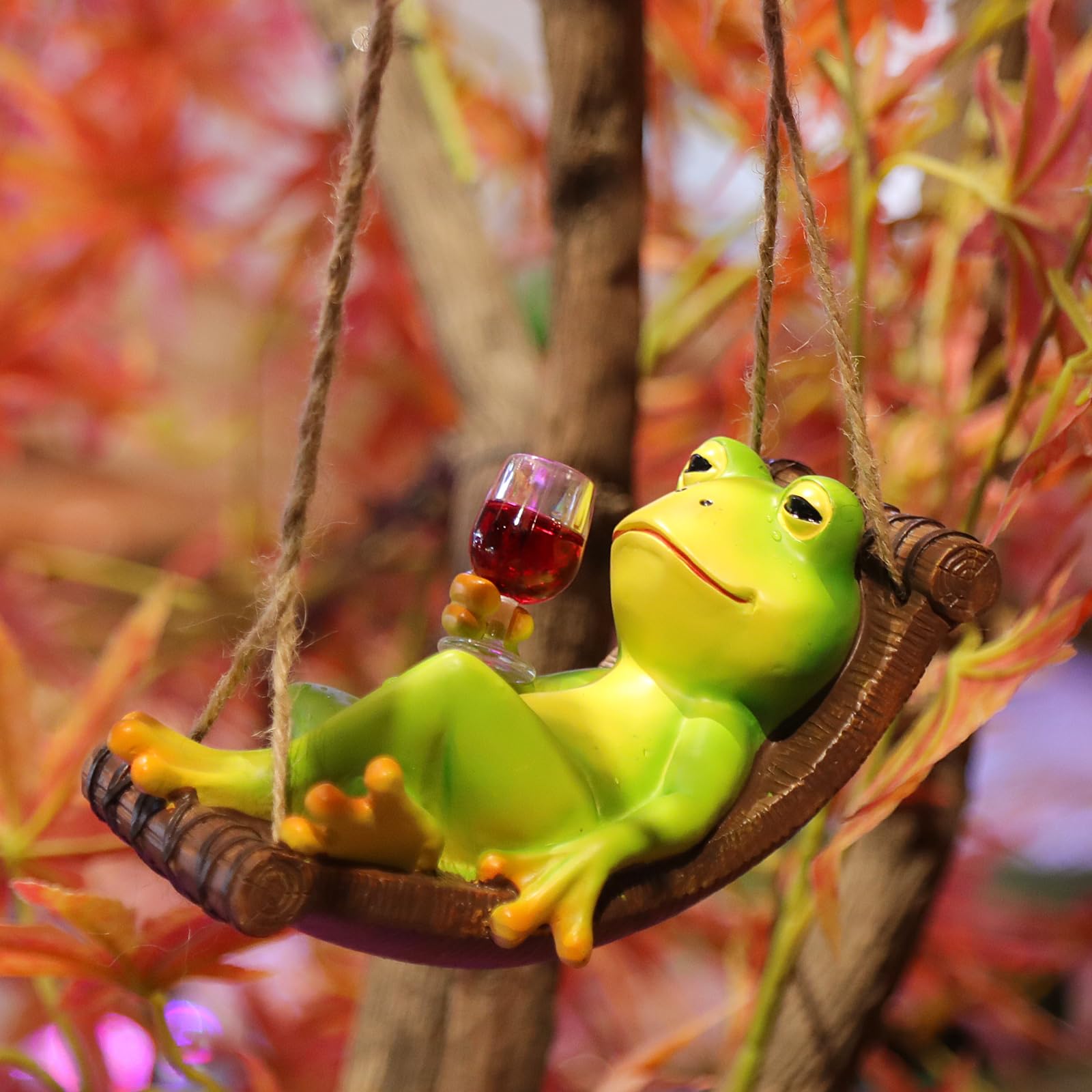 NINIPAPA outdoor frog figurine brightens yards with playful party vibes.