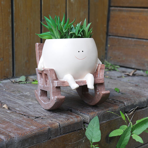 NINIPAPA rocking-chair pot for indoor plants highlights playful movement.