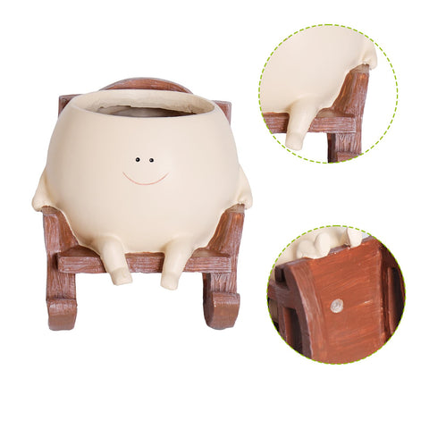 NINIPAPA smiley planter on table decorates shelves or desks.