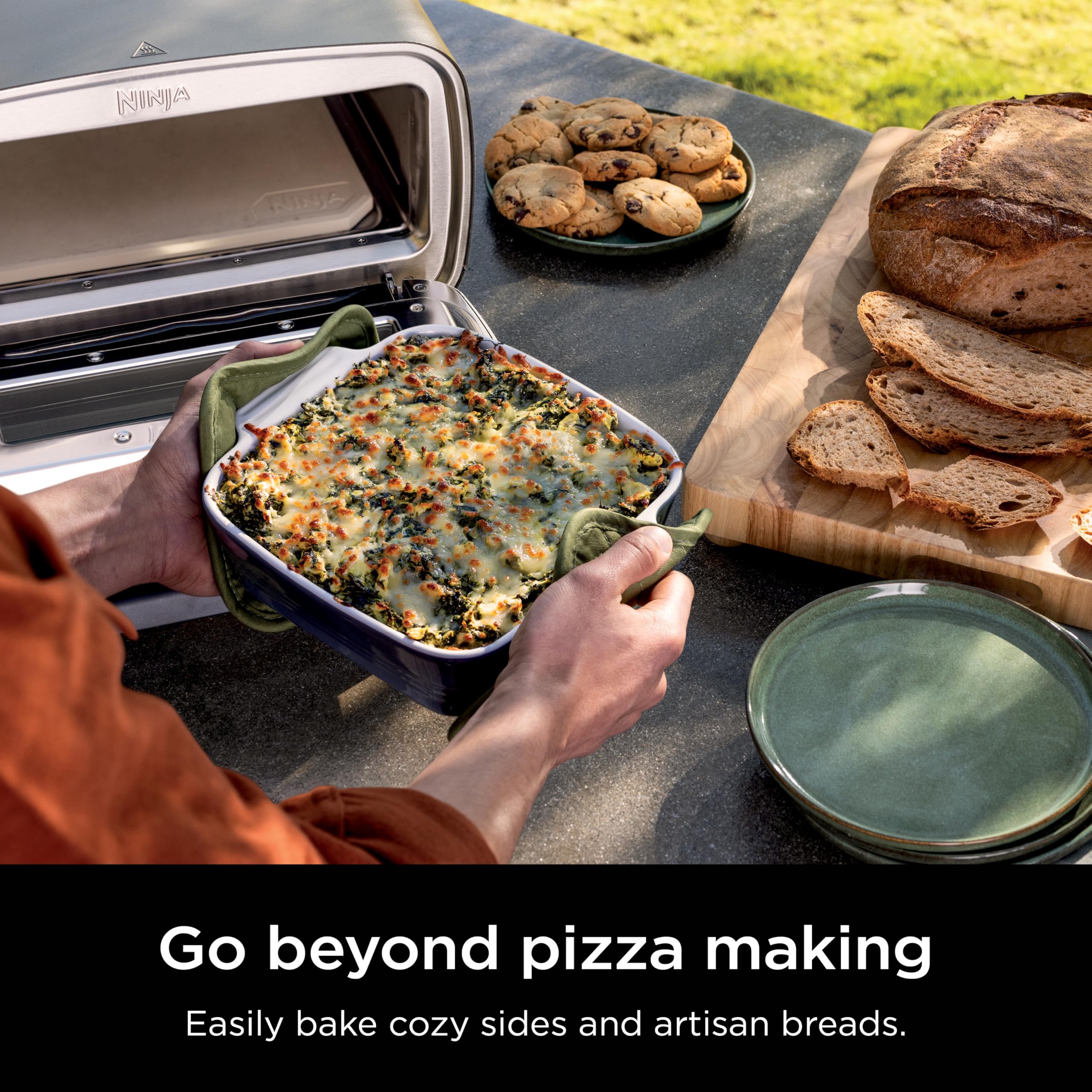 Ninja Artisan Outdoor Pizza Oven with a 12-inch pizza ready in minutes