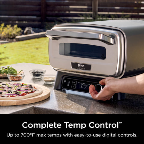 Ninja Artisan Outdoor Pizza Oven top-angle view showing the cooking chamber