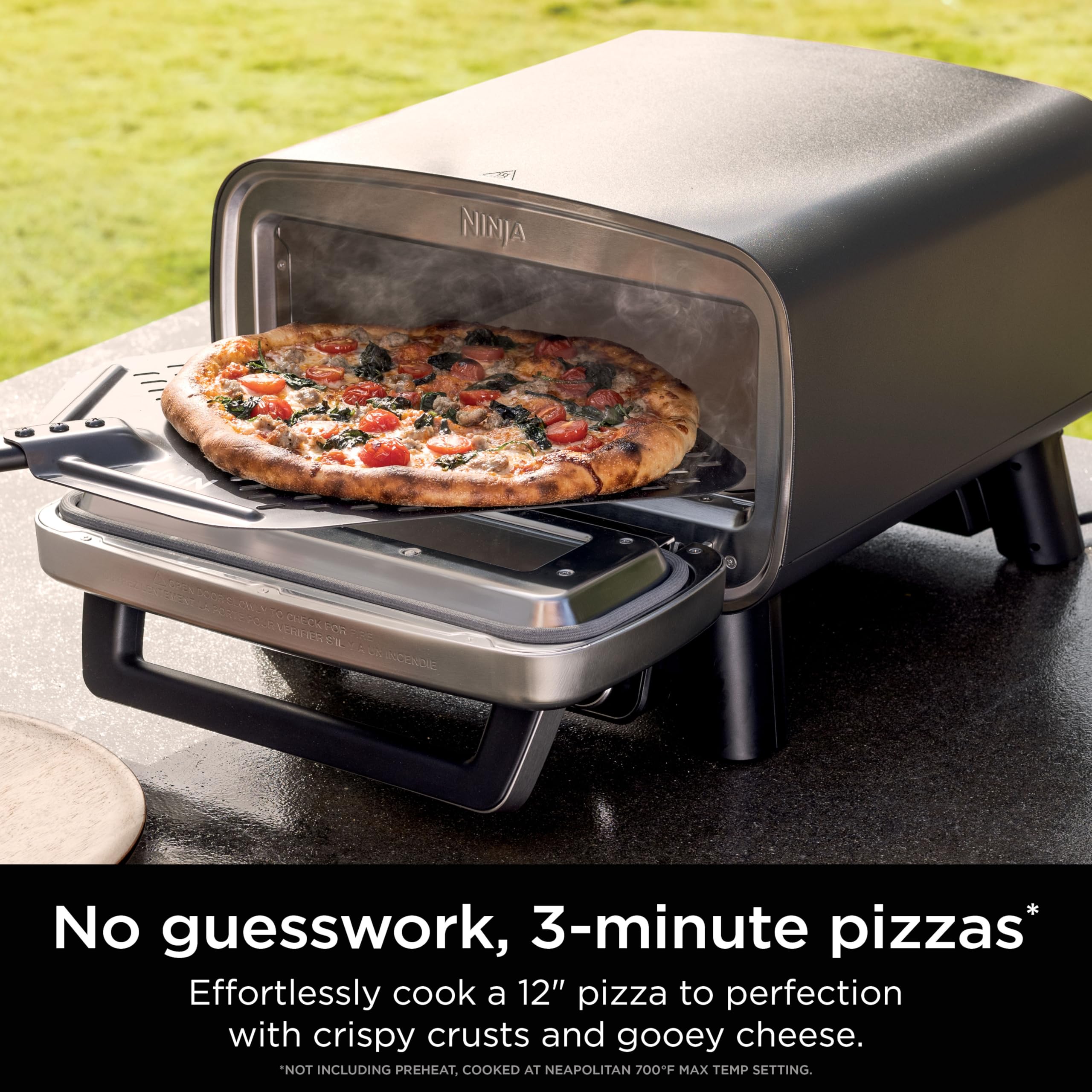 Ninja Artisan Outdoor Pizza Oven door/window view during baking
