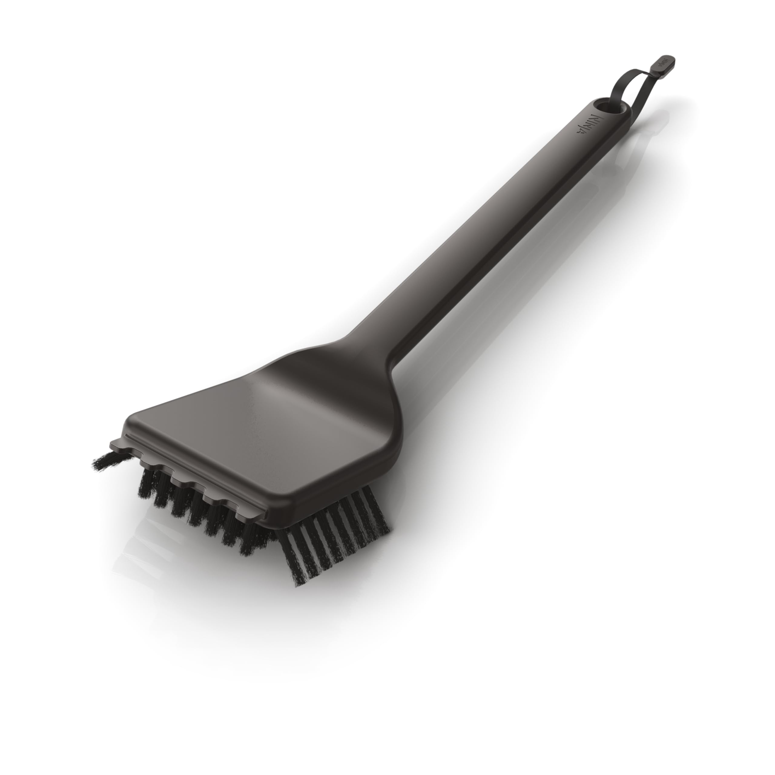 Ninja XSKBRUSHXL brush close-up showing sturdy bristles for thorough grill cleaning.