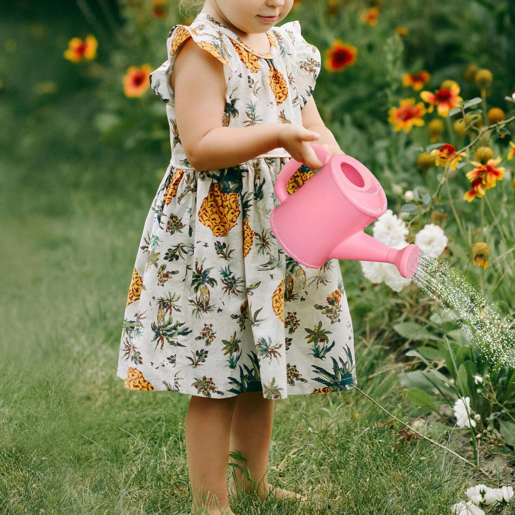 NIOIPXA kids watering can yellow 700 ml capacity for indoor plants.