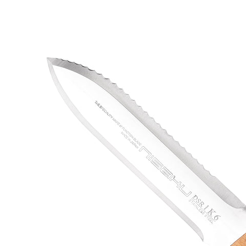 Nisaku NJP651 hori knife in ground showing precise control while planting.