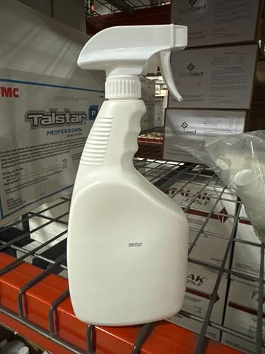 Nisus Web Out Cobweb Eliminator outdoors near garage; safe in well-ventilated areas.