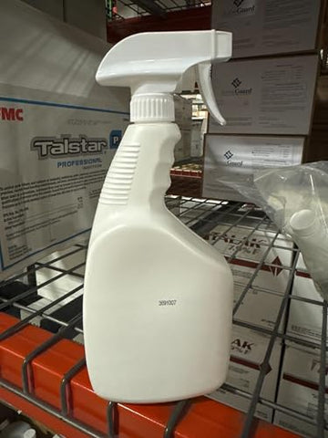 Nisus Web Out Cobweb Eliminator outdoors near garage; safe in well-ventilated areas.