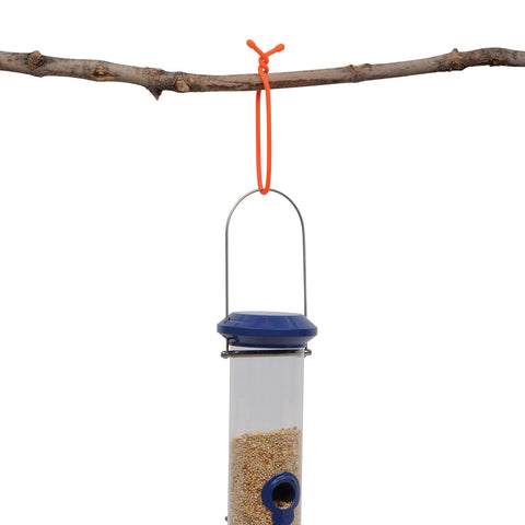 Nite Ize Gear Tie outdoor-ready view shows weather-resistant use on garage and patio.