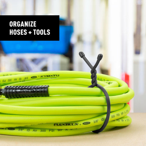 Nite Ize Gear Tie grips power cords securely for neat storage.