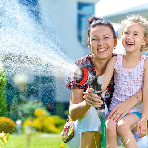 Niyopdg hose nozzle used for car and pet cleaning outdoors.