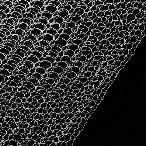 Noamus rust-resistant mesh guards roots without compromising airflow.