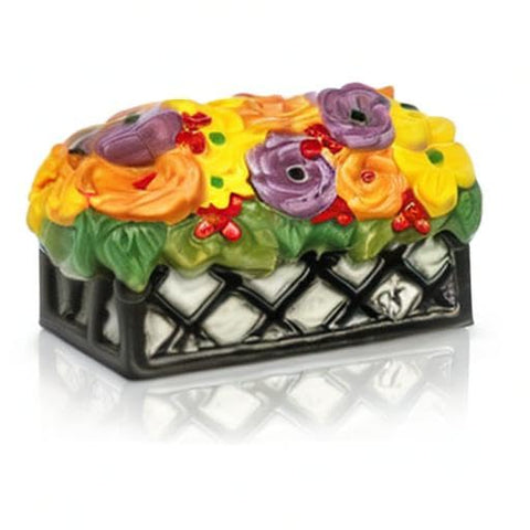 Nora Fleming gift-ready floral mini for seasonal gifting.
