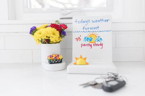 Interchangeable minis fit securely into the base for flexible seasonal displays.