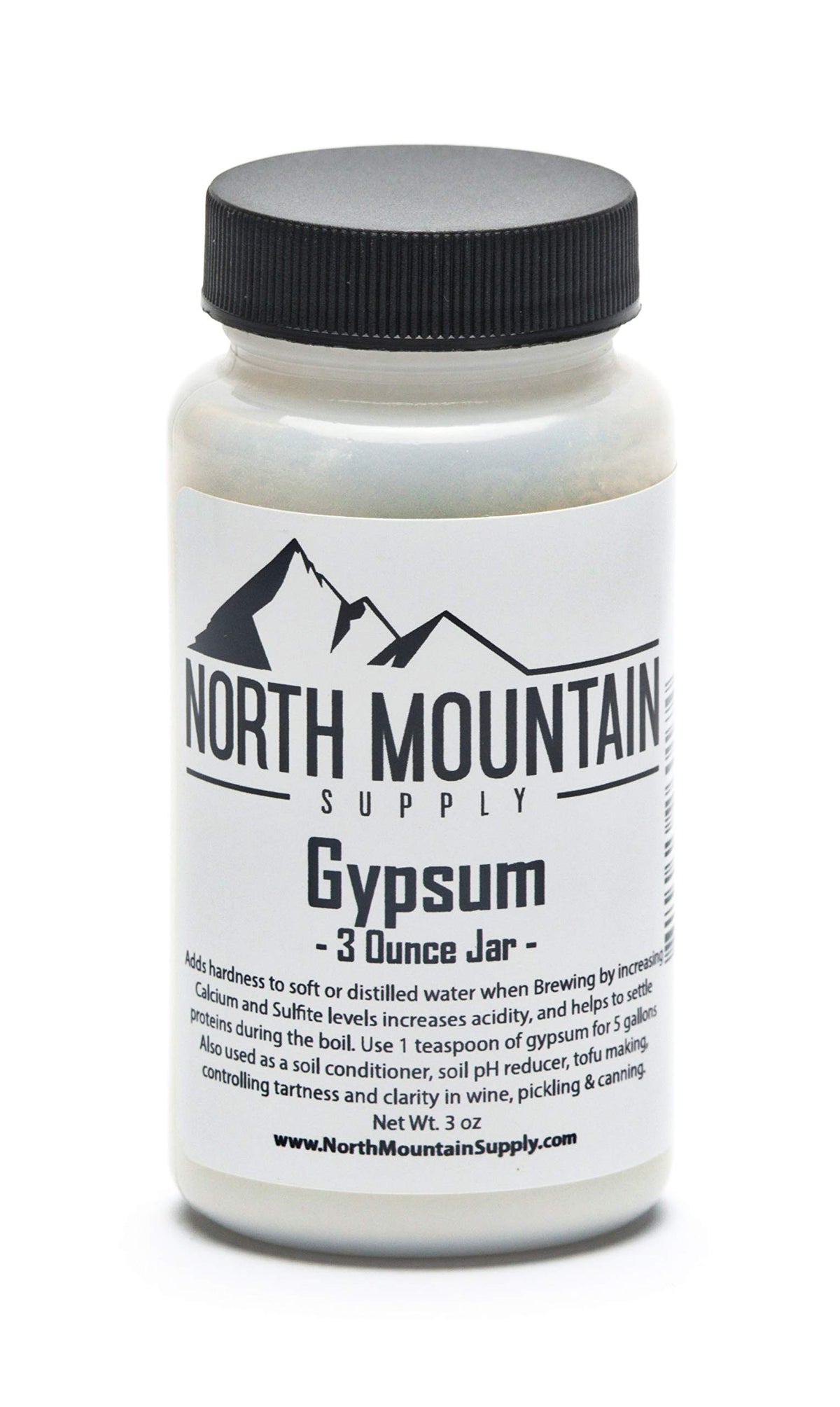 North Mountain Supply gypsum 3 oz jar on countertop, enhances brewing water hardness for better flavor.