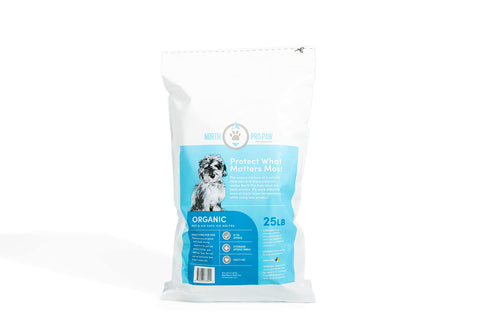 Northern Salt North Pro Paw being applied on a sidewalk to protect pet paws.
