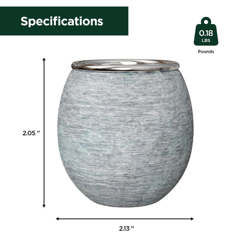 Northwood Sauna aroma stone cup placed among sauna stones for diffusion of oils.
