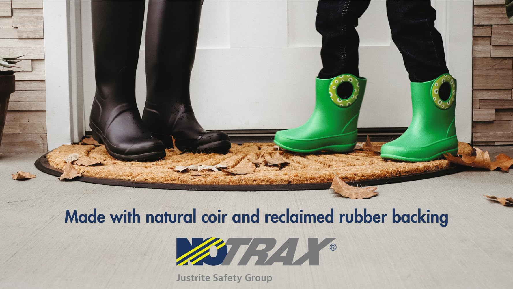 Notrax coconut coir fibers scrape dirt from shoes at the doorway.