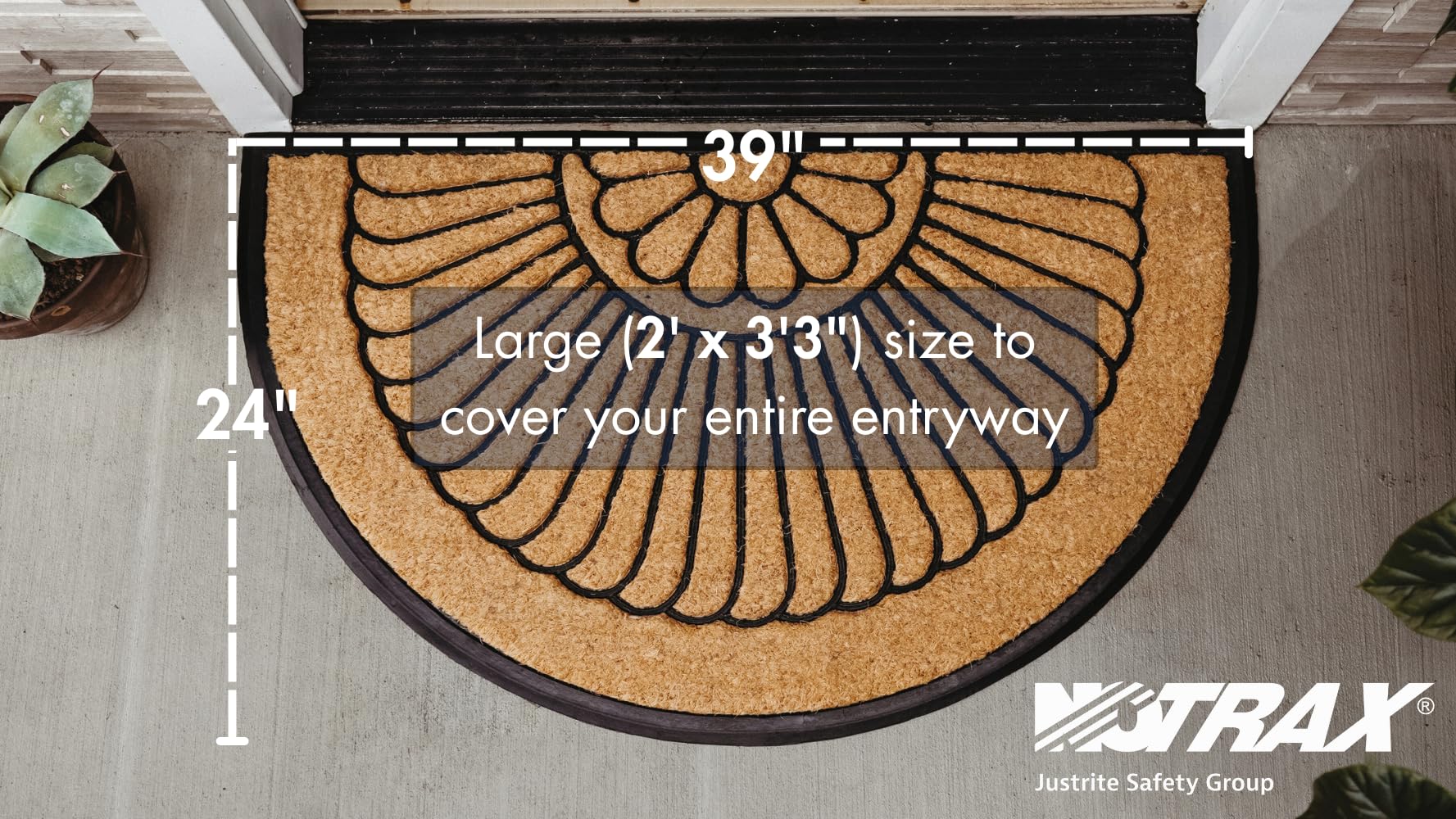Notrax rubber-backed mat prevents slipping on wet surfaces at thresholds.