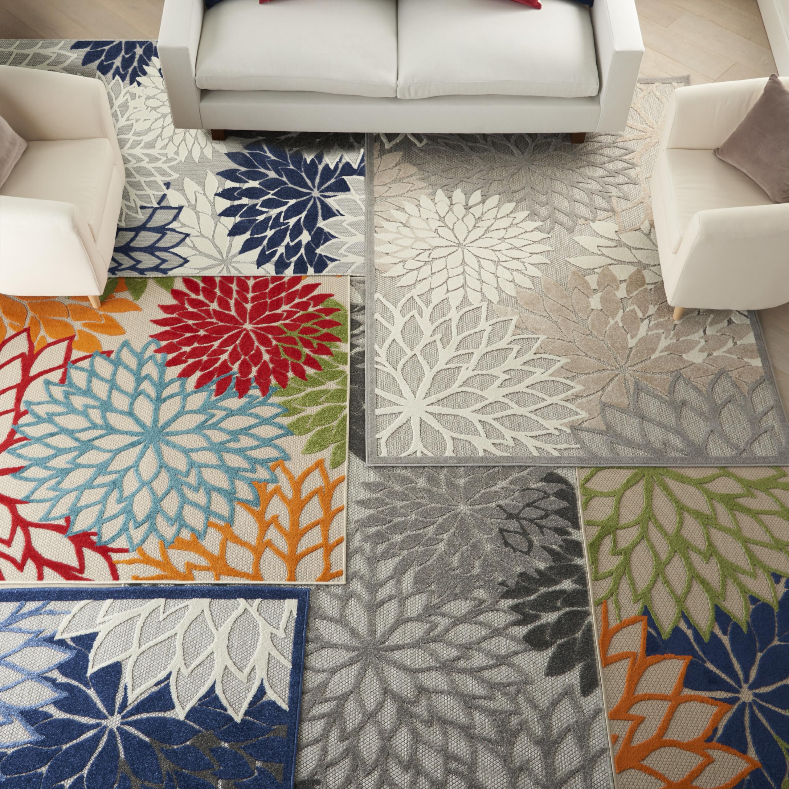 Nourison Aloha colorful pattern complements outdoor furniture.