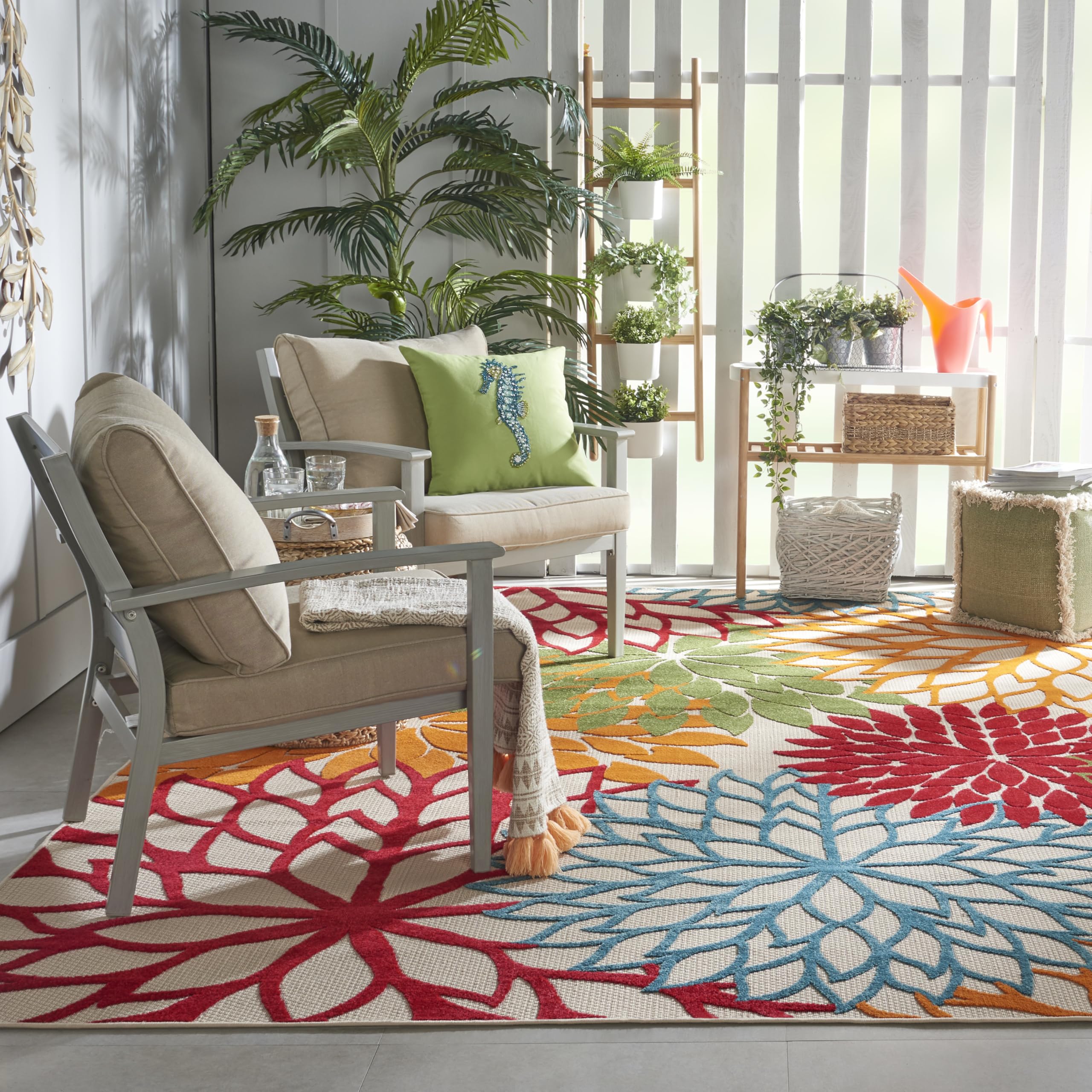 Nourison Aloha flat-weave texture highlights raised patterns for tactile appeal.