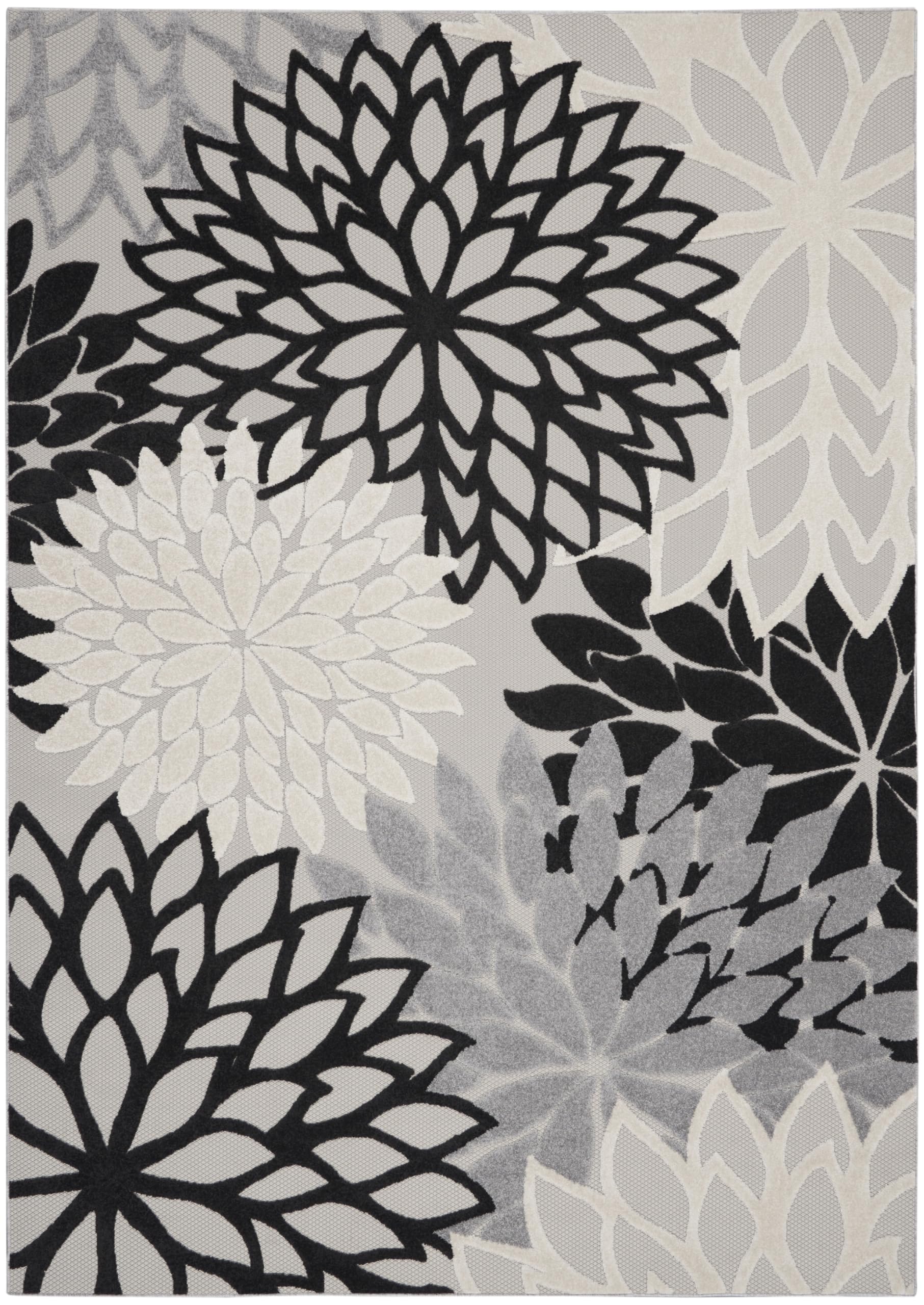 Nourison Aloha flat-weave rug featuring raised patterns for subtle luxury.