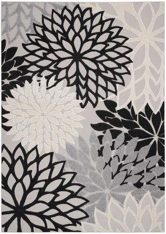 Nourison Aloha flat-weave rug featuring raised patterns for subtle luxury.