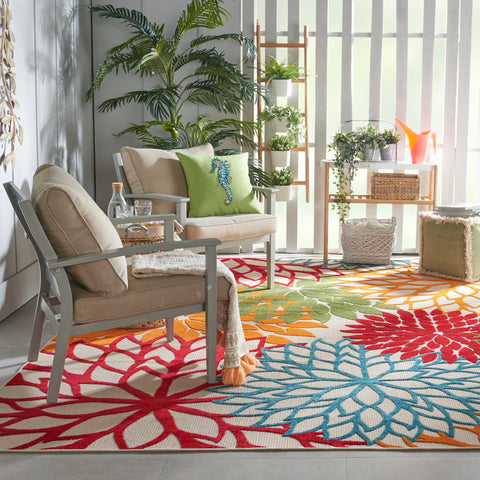 Nourison Aloha flat-weave texture highlights raised patterns for tactile appeal.