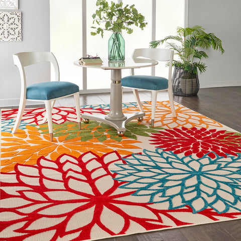 Nourison Aloha floral outdoor rug closeup showcases high-low texture and vibrant hues.